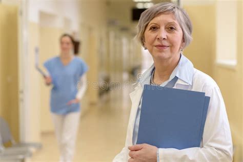Doctor In Hospital Corridor Stock Photo Image Of File Intern 57484452