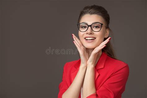 Young Woman Is Positive Her Palms Near The Face Glasses And Bright
