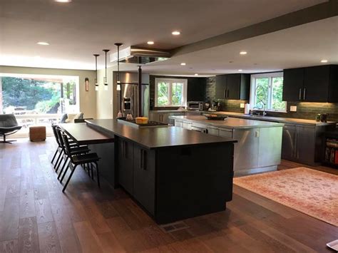 Modern kitchen cabinets are characterized by this sleek, more angular design with a simplicity in their doors and frames. Kitchen Remodel - Modern - Kitchen - New York - by Designs By Cindy
