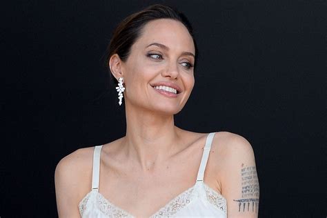 Angelina Jolie Poses In Lingerie In Paris