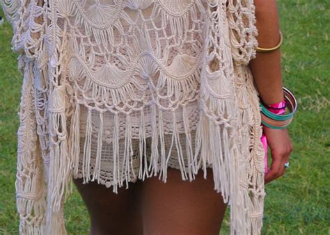 A Close Up Of A Person Wearing A White Dress