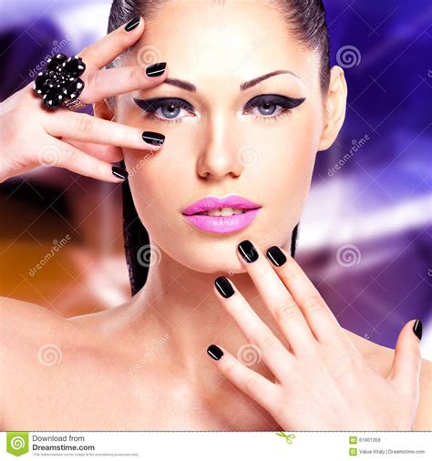 Portrait Of A Beautiful Fashion Woman With Bright Makeup