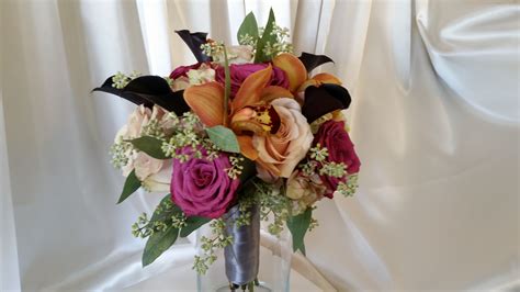 Bridesmaids Bouquet Has The Added Spark Of Fabulous Blueberry Roses