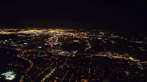 Flying Into Newark Nj At Night Time With Full Moon In The Back Ground