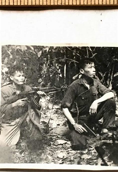 Photograph Of Viet Cong Officer With M And An Aide With A