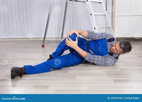 An Injured Man Holding His Leg Stock Photo Image Of Accidental