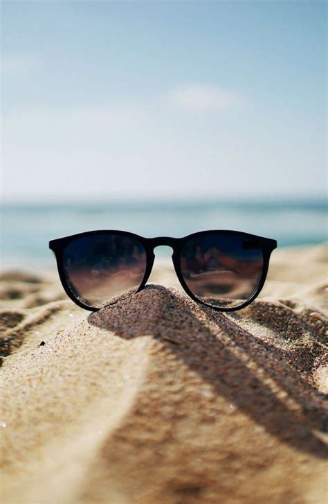 Black Sunglasses On The Beach Aesthetic Iphone Wallpaper In 2020 Cute