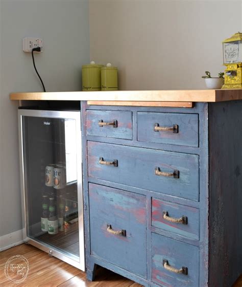 Give that space between your fridge and the wall a whole new purpose with this great storage cabinet hack. diy counter with mini fridge - Google Search | Mini fridge ...