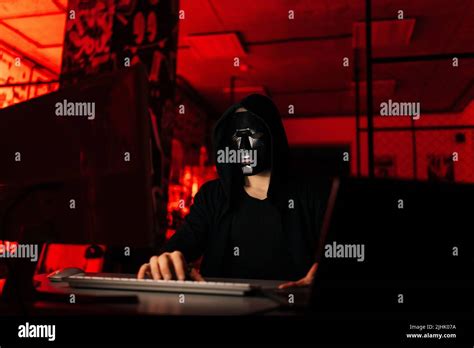 Dangerous Unrecognizable Hacker Man Wearing In Black Mask And