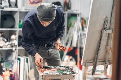 Man Holding Paint Brush And Pallet Stock Image Image Of Alone Paints