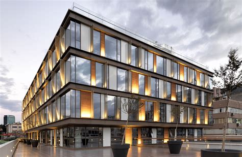 Muum Designed Office Building Is A Quiet Oasis In The Heart Of Bustling