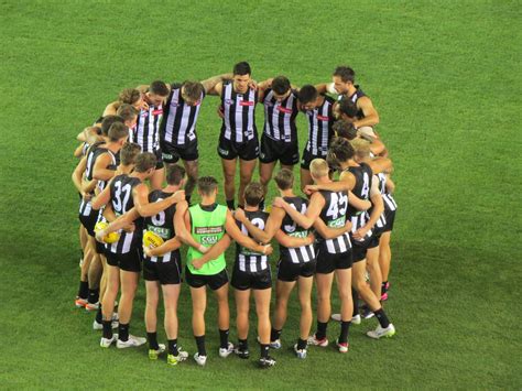 A Group Huddle Before The Game Round 2 Vs Adelaide 2015 Photo By