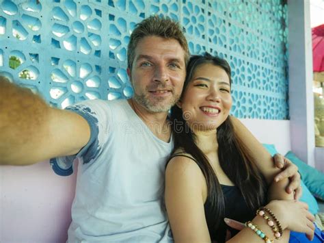 Happy Mixed Ethnicity Couple In Love Smiling Cheerful With Handsome