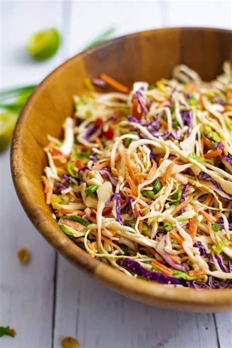 Asian Cabbage Slaw With Peanut Sesame Dressing Bites Of Wellness