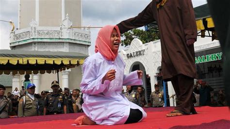 Woman Publicly Caned In Indonesia For Being In “close Proximity” To A