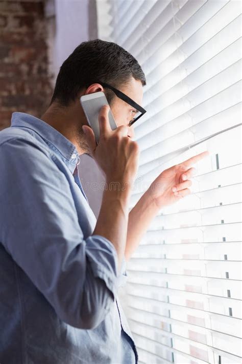 Businessman Looking Through Blinds Stock Photo Image Of Discovery