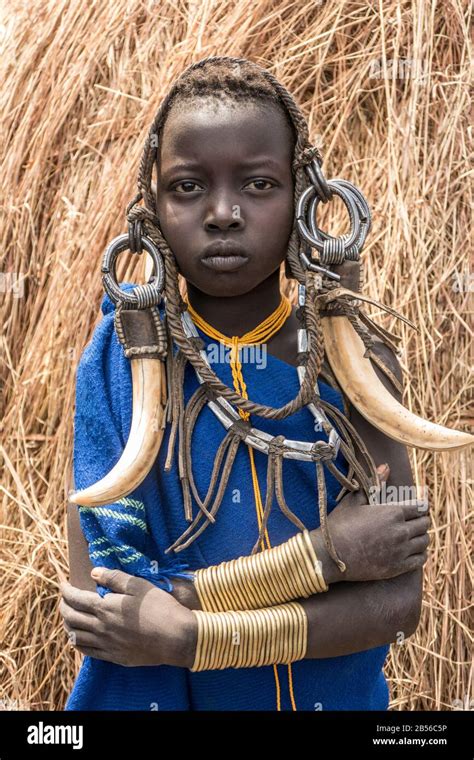 A Traditional Ethiopian Mursi Tribe Ethnic Group Young Woman In