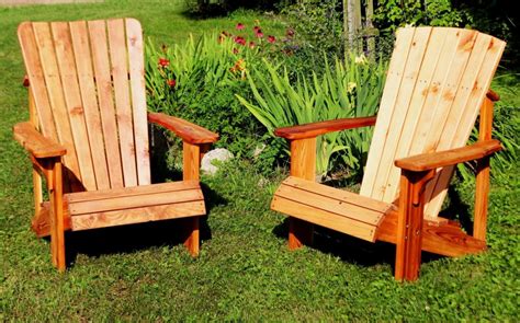 Two Teak Adirondack Chairs