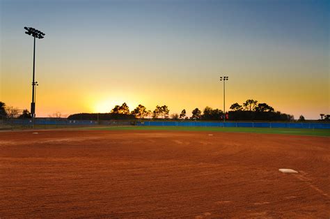 Baseball Field At Sunset The Setting Sun Casts A Warm Glow Flickr