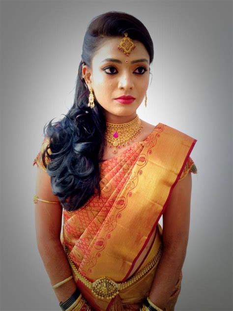 Traditional Southern Indian Bride Wearing Bridal Hair Saree And