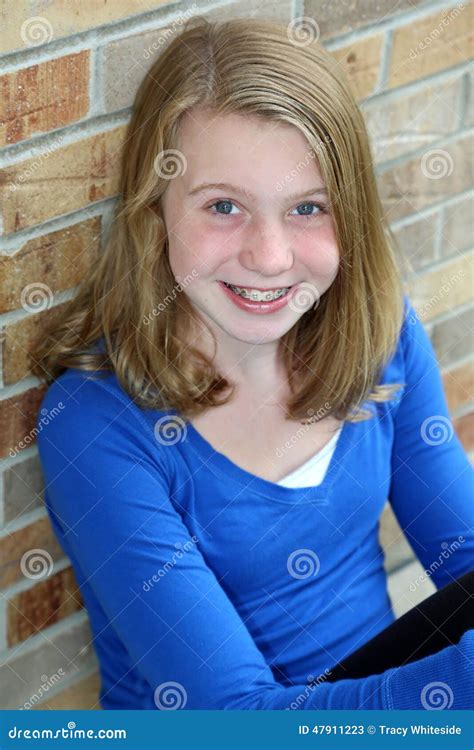 Smiling Blonde Girl With Blue Eyes Stock Image Image Of Dental Average 47911223