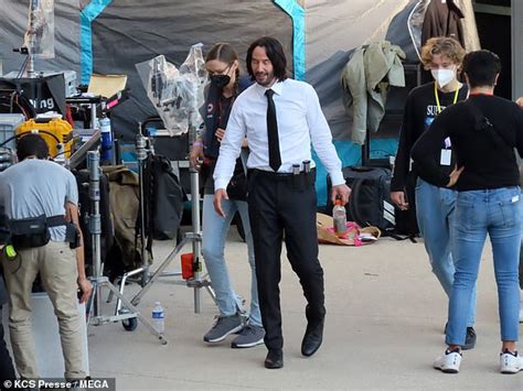 Keanu Reeves Spotted Helping Crew Members Move Equipment While Filming