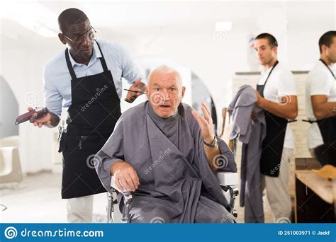 Senior Man Unpleasantly Surprised By Haircut From African Hairdresser