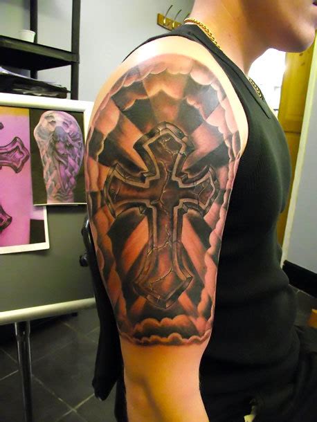 Religious Cross Half Sleeve Tattoo Idea