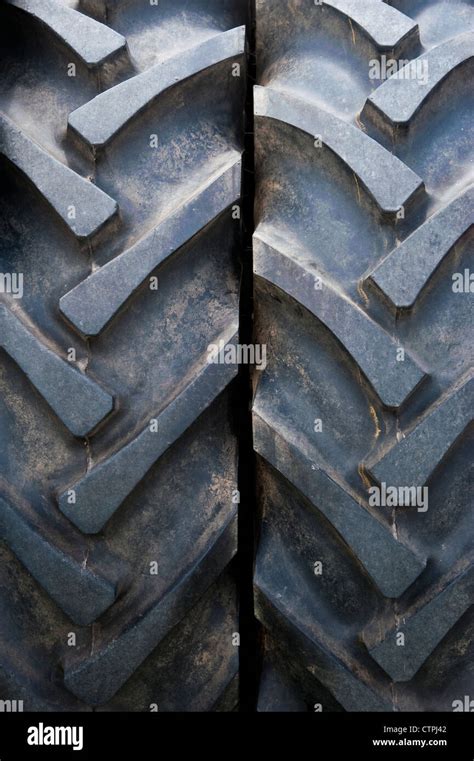 Two Tirestyres On A Vintage Tractor Arranged In Pairs On The Rear