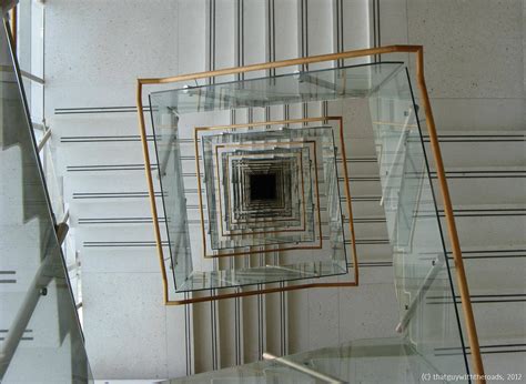 Dazzling Square Spiral Staircase With Clear Glass And Also Wooden