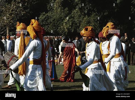 indian prime minister indira gandhi in new delhi sunday jan 30 1984 with folk dancers