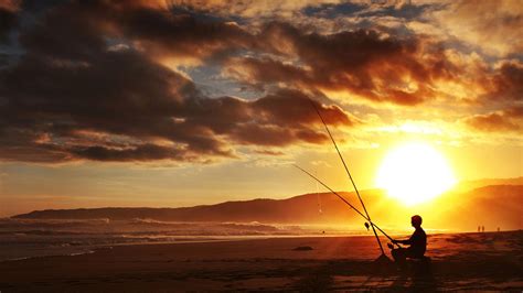 Free Download Man Fishing On Beach In Sunset Hd Wallpaper Wallpaper