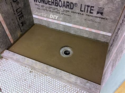How to build a DIY shower pan out of dry pack mortar - almost finished
