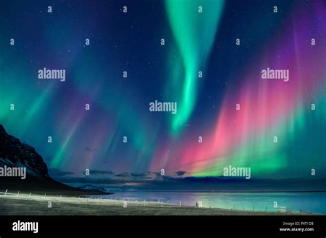 Colorful Northern Lights Aurora Borealis With Green Blue Purple Red