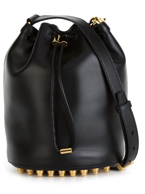 Alexander wang is still young, but it's been a little while since he was the golden child of the accessories market. Alexander Wang Alpha Leather Bucket Cross-Body Bag in ...