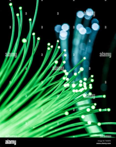 Bundle Of Optical Fibers With Green Light Black Background Stock Photo