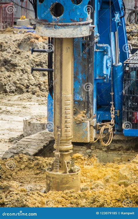 Hydraulic Drilling Machine Is Boring Holes In The Construction Site For