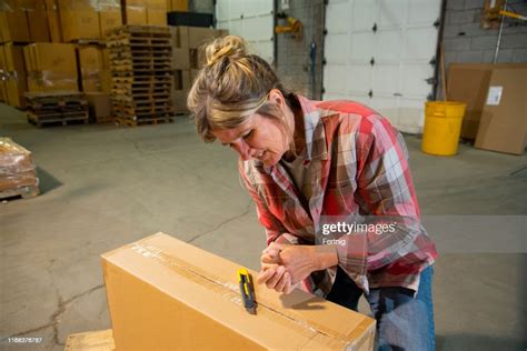 An Industrial Workplace Warehouse Safety Topic A Female Employee With