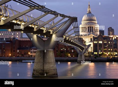 Millenium Bridge And Saint Pauls Cathedral London England Stock