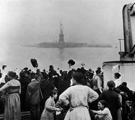 Immigrants Celebrate Seeing The Statue Of Liberty As Their Ship Pulls