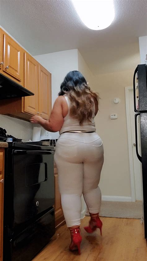 Miss Strongbutt Works Walks And Poses In The Kitchen Wearing Skintight