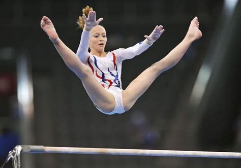 Ksenia Semenova On Uneven Bars At The Olympics Gymnastics Pictures Gymnastics Photos