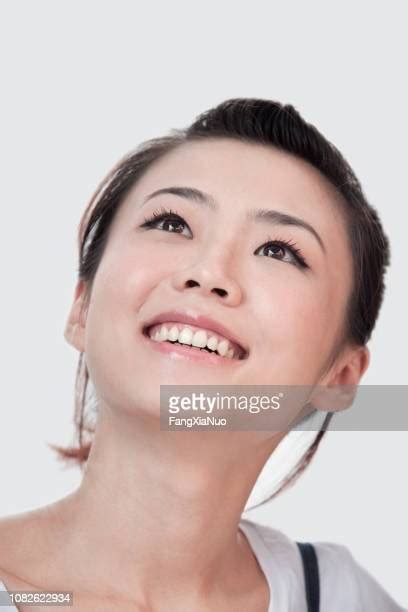 Asian Girl Smiling Teen Low Angle Photos And Premium High Res Pictures