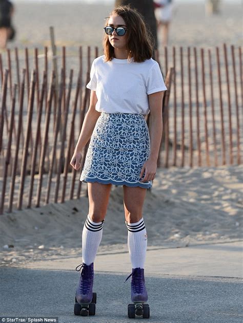 Maisie Williams Looks Cute In Mini Skirt And Football Socks While