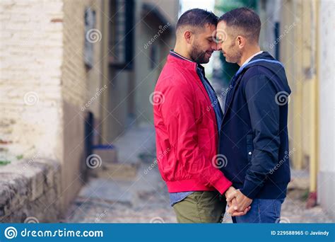 Gay Couple In A Romantic Moment In The Street Stock Image Image Of