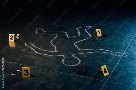 Chalk Outline And Evidence Markers At Crime Scene Stock Photo Adobe Stock