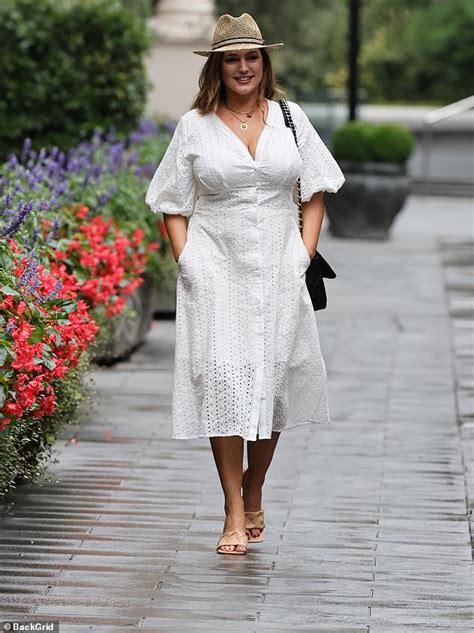Kelly Brook Is Stylish In White Dress And Fedora After Revealing Trolls Have Branded Her
