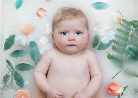 I put my baby in the tub with a mat as she can also sit up on. Milk Bath Photography Tutorial | Learn how to create ...