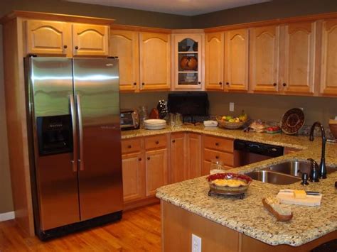 Should kitchen cabinets be painted lighter or darker than the walls? Kitchen Paint Colors Oak Cabinets With Island Design ...