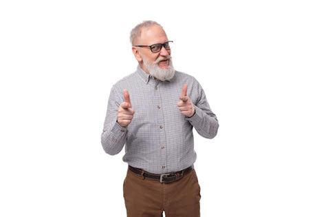 Premium Photo A Handsome Old Man With A Mustache And A Beard In Glasses Is Dressed In A Shirt